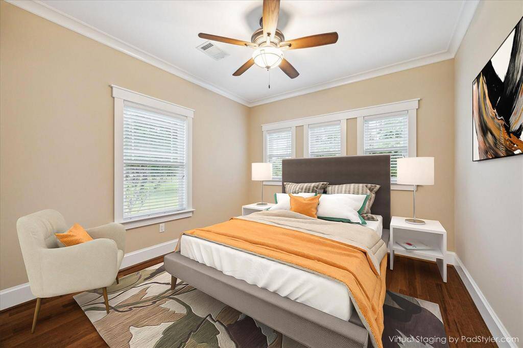 THE VIEWS OUT OF THIS SECONDARY BEDROOM ARE WORTH WAKING UP TO! CROWN MOLDING, WOOD FLOORING AND A CUSTOM CLOSET ARE ALL FEATURES OF THIS BEDROOM WHICH IS SUITED FOR A QUEEN BED AND FURNITURE