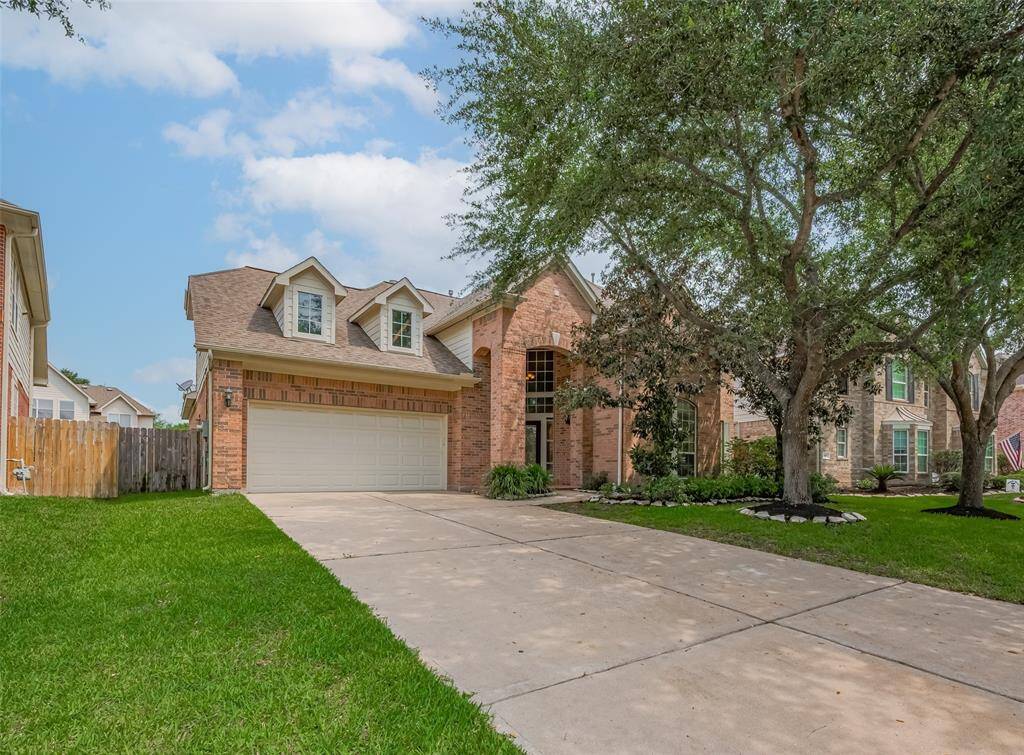 Long Driveway and two car garage