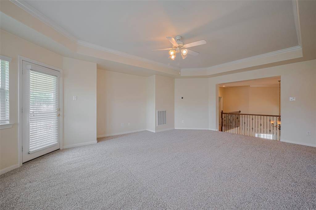 another view of the Gameroom with door leading to the balcony