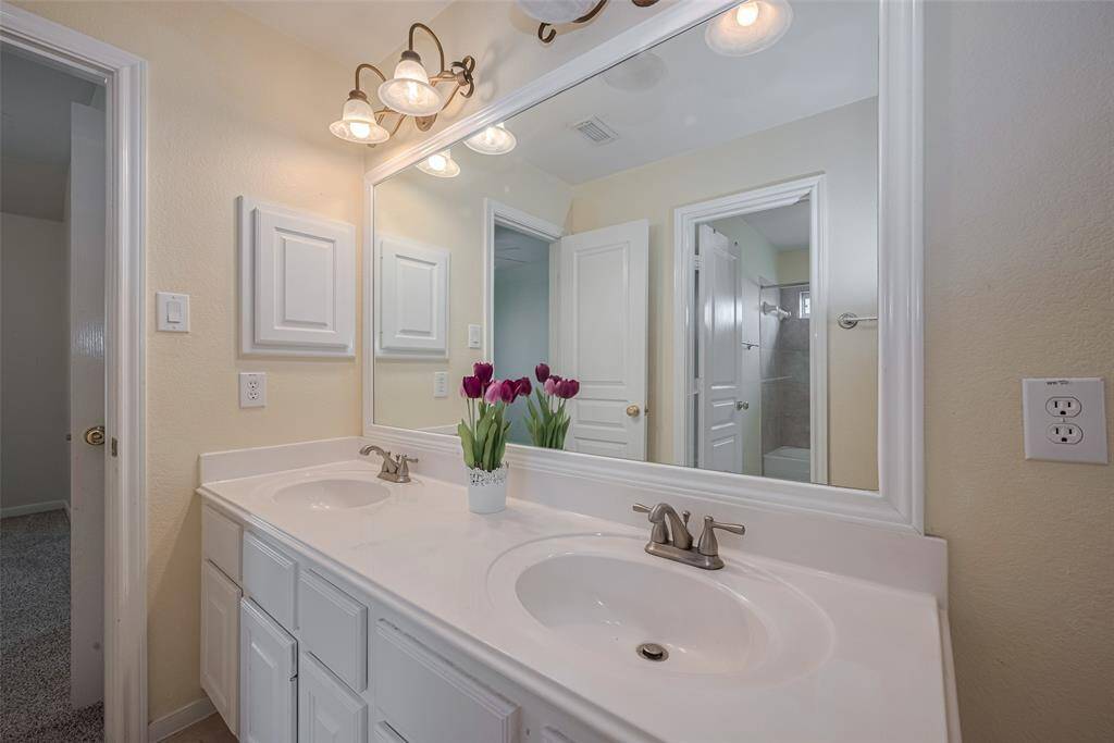 Full bathroom with double sink