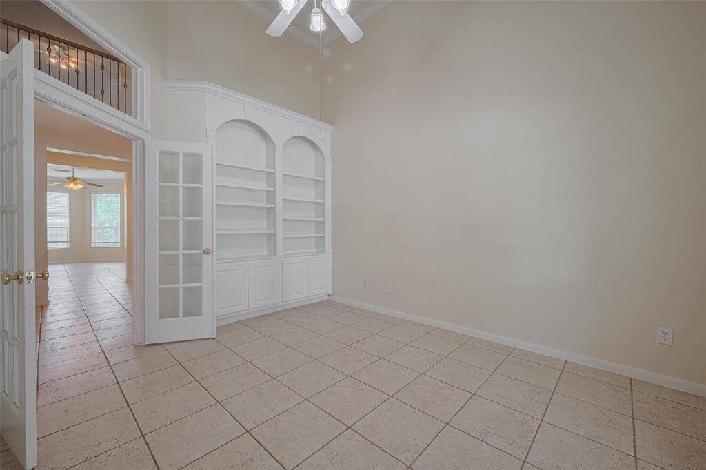 Study with French doors and built-in bookcase