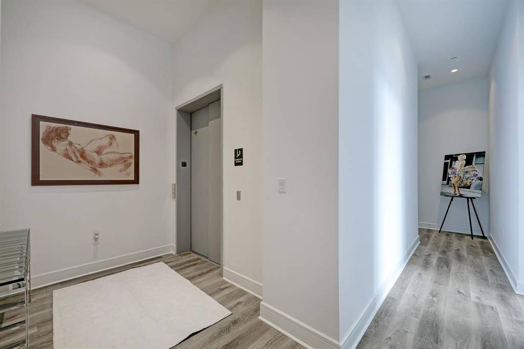 Exclusive elevator bank opens to the unit, the hall on the right is to the main entrance door.