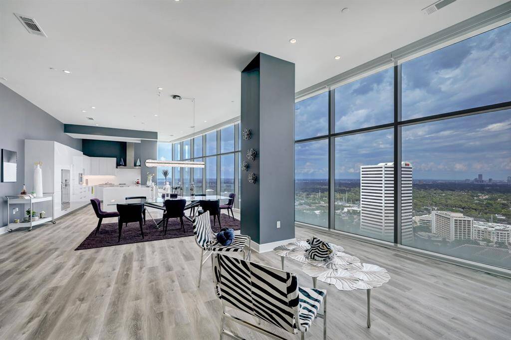 An impressive color pallet blends with cerulean sky, wide plank matte finished floors lengthen open plan and taller ceilings give a feeling of endless expanse whilst maintaining an intimate setting.