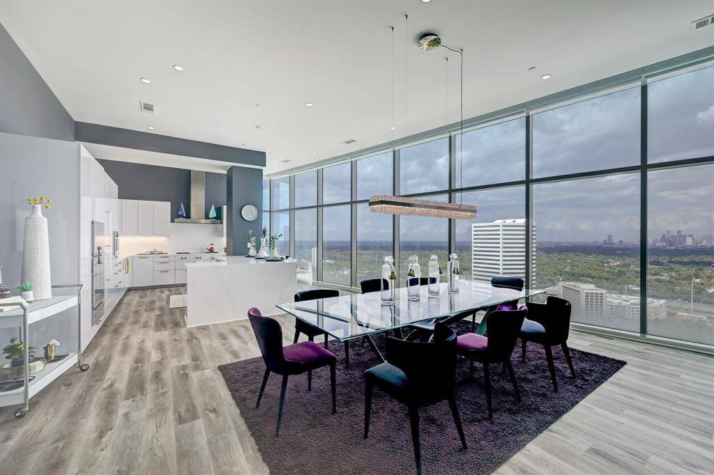 The wall of huge windows stretches the length of the entire home.