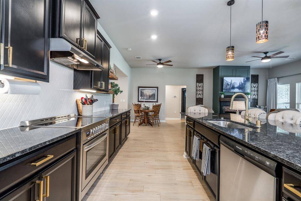 Truly a Chef's kitchen. Spacious Island with lots of prep area and a 36" range/oven