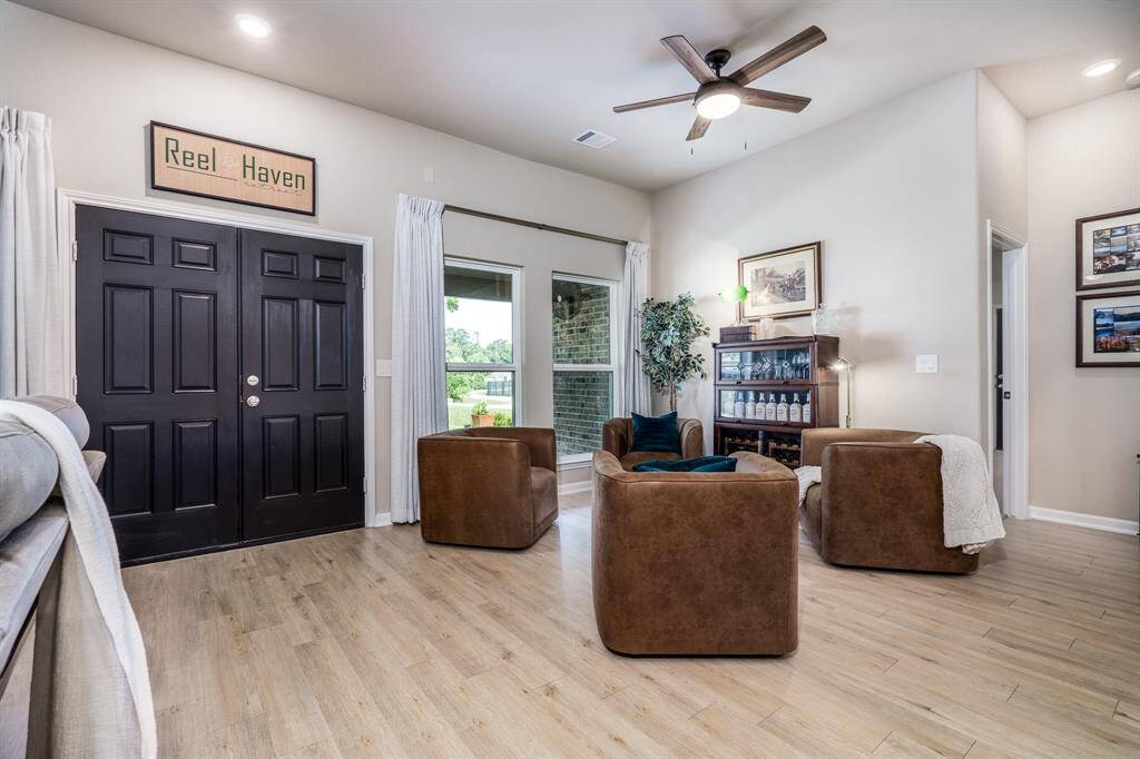 Double Entry doors with views of the lake from your sitting area