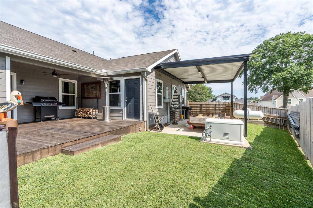 Covered Boat or trailer parking, Back Up Generator, and patio area.