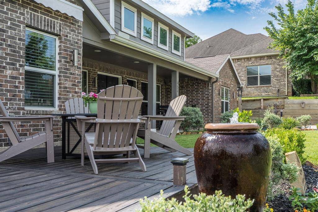 A wrap around deck with access to the patio and the Primary Bedroom.