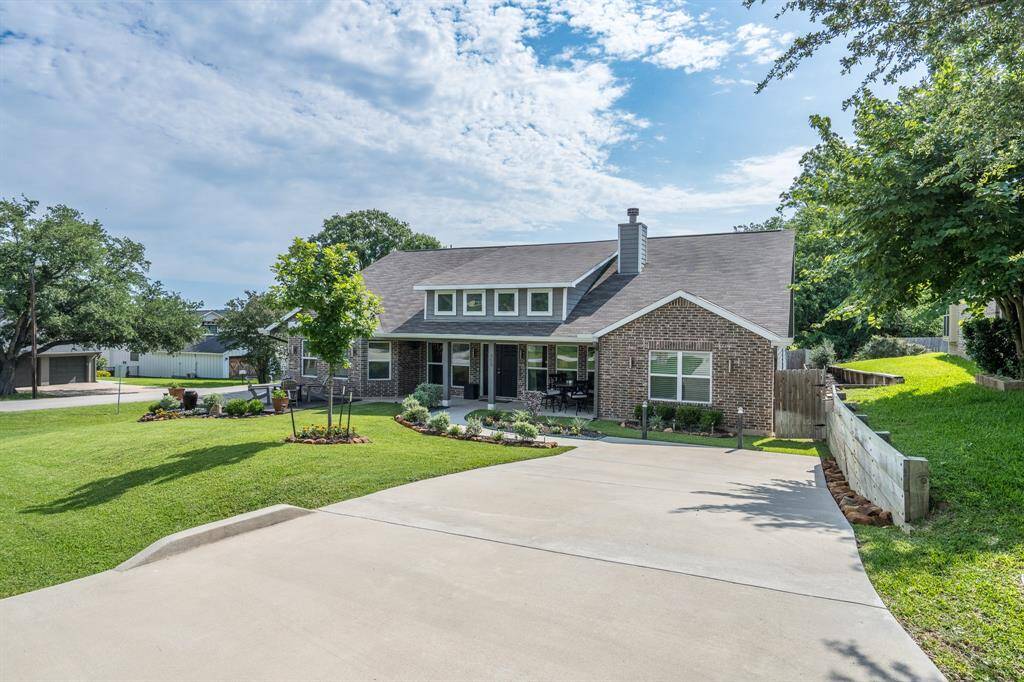 Additional Parking on the ride side of the home with a garage and boat parking on the other side.