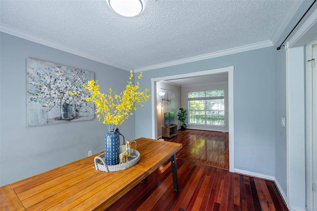 The formal dining room flows effortlessly into the kitchen, family room, and living room.