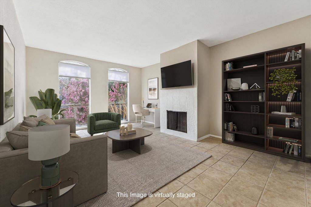 One of the few units that have a beautiful wood burning fireplace.