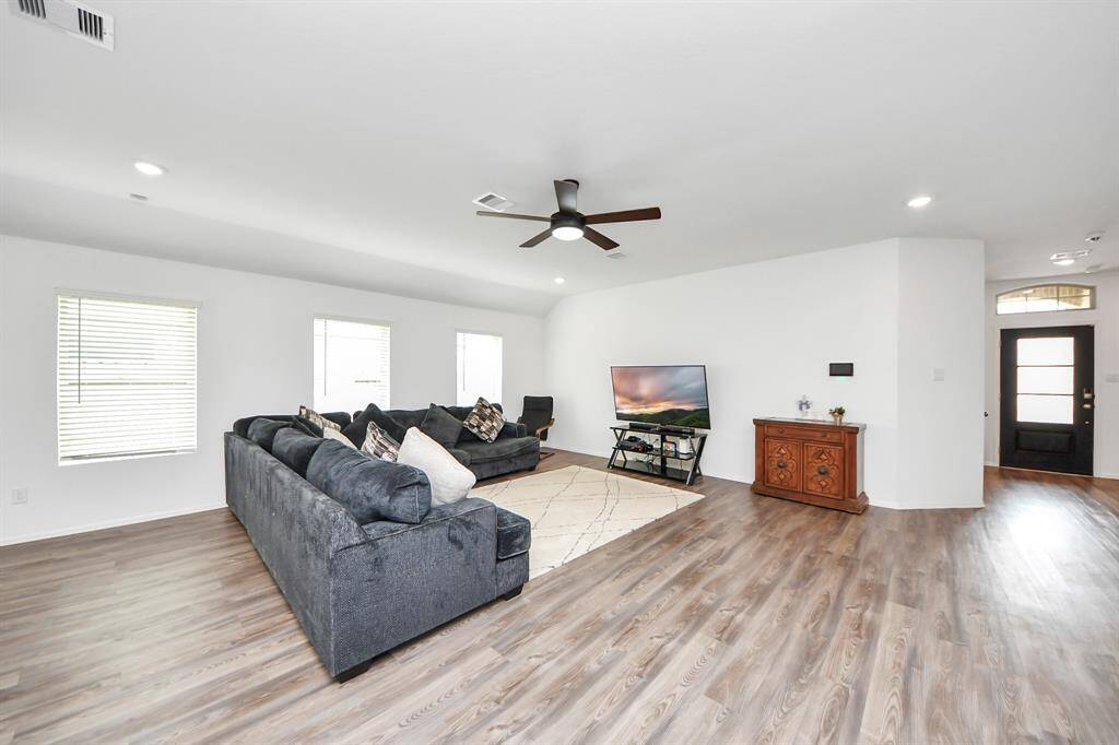 Windows give lots of natural light to living room.