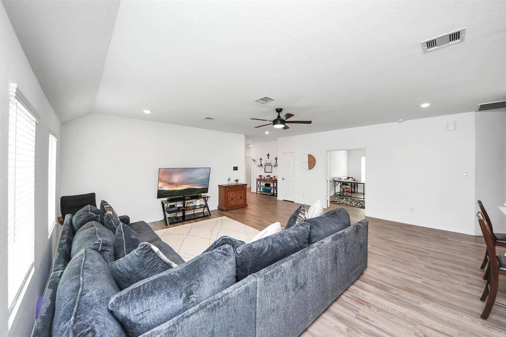 View of living room with opening to private office.