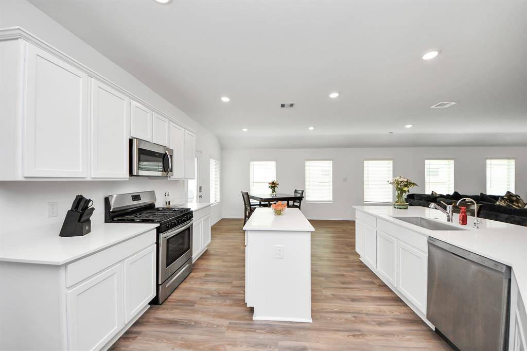 Kitchen open to dining space.