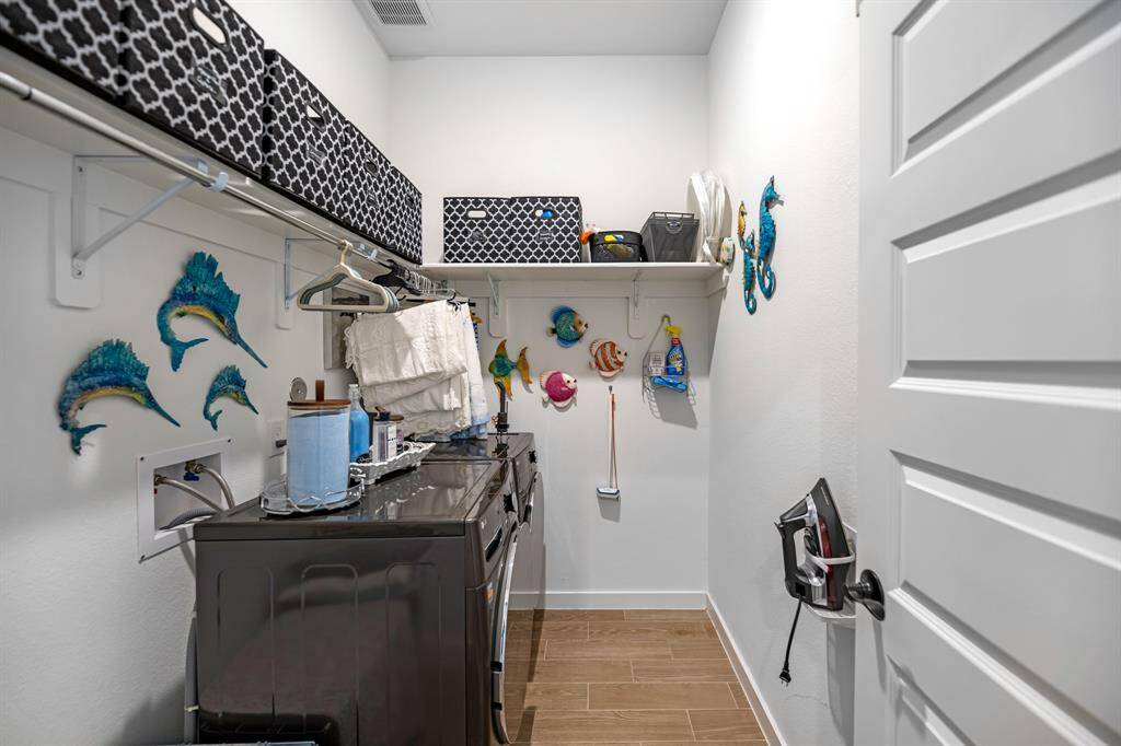 Laundry room with extra storage space.