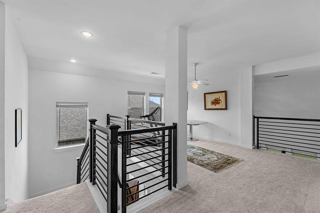 Head upstairs to a spacious game room/work out area.