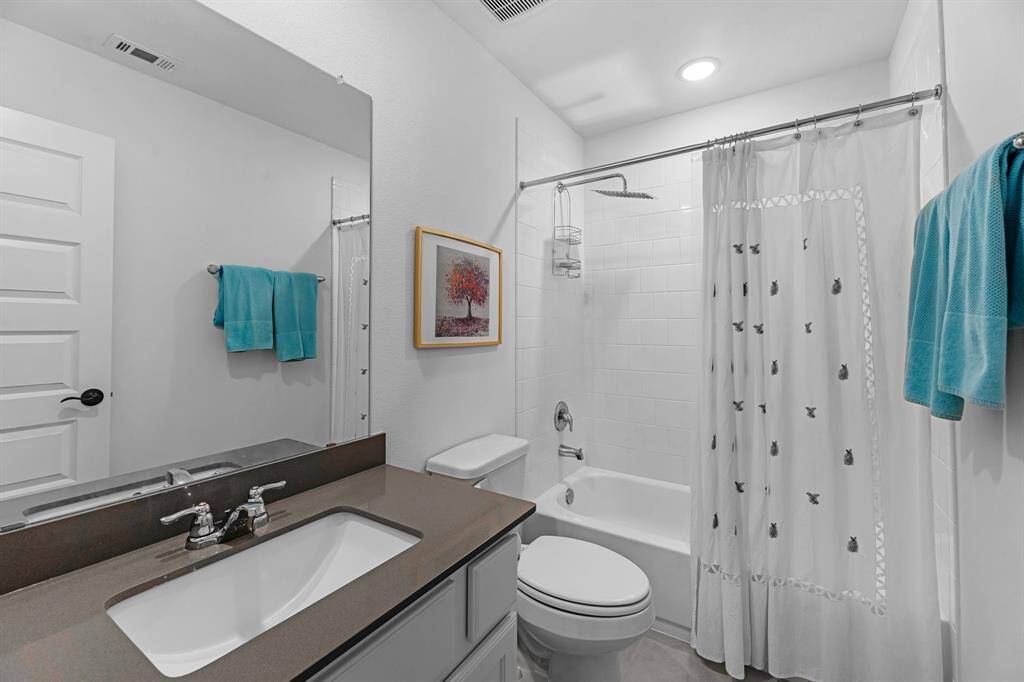Full bath #4 upstairs also features the Rain Shower Head.