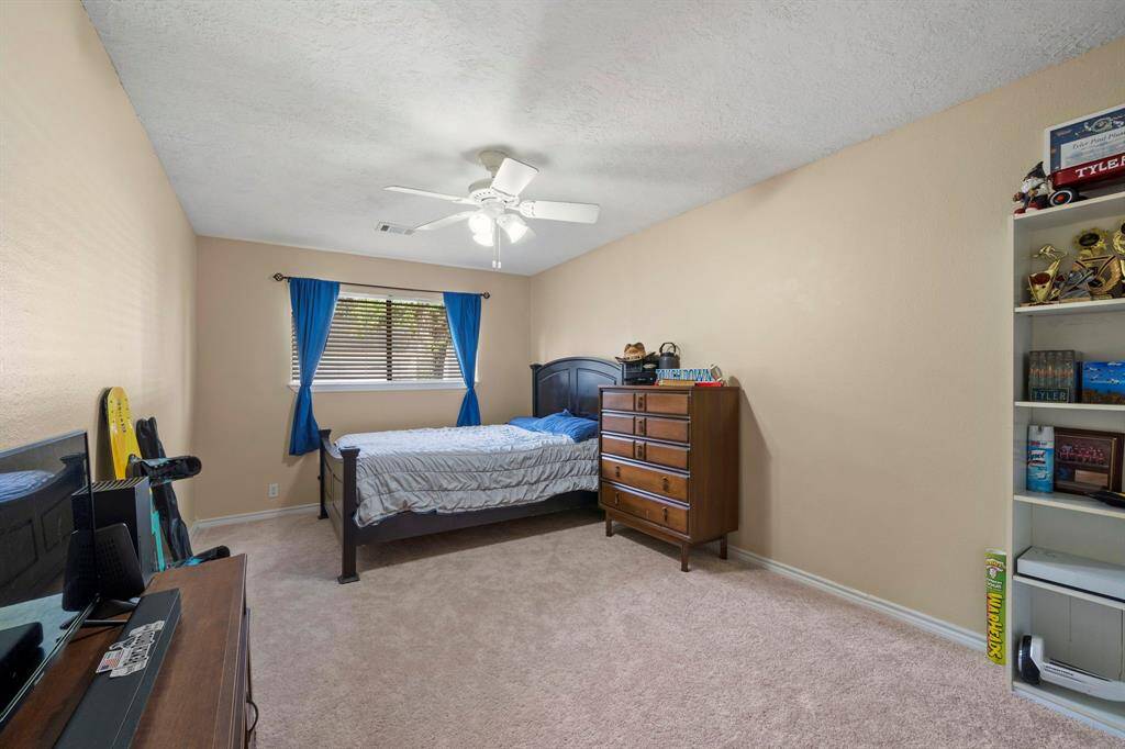 Fourth bedroom is extra big with large walk-in closet and a ceiling fan. This room can accommodate two queen size beds along with dressers.  It's a huge room.