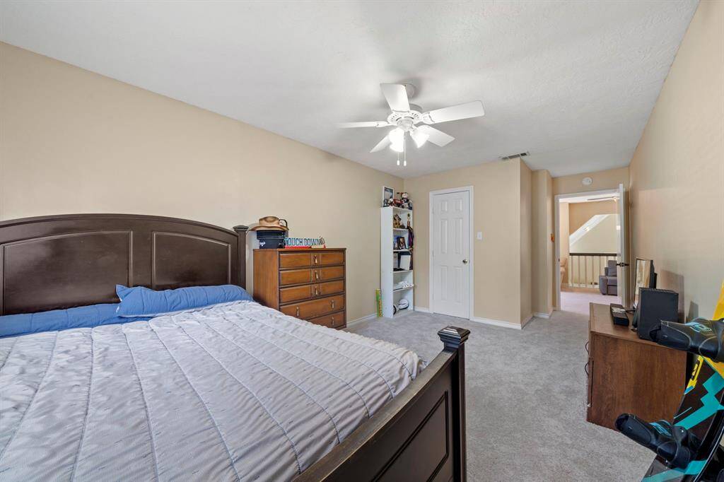 Another view of the Fourth bedroom shows just how spacious this room is along with lots of natural light and large walk-in closet.