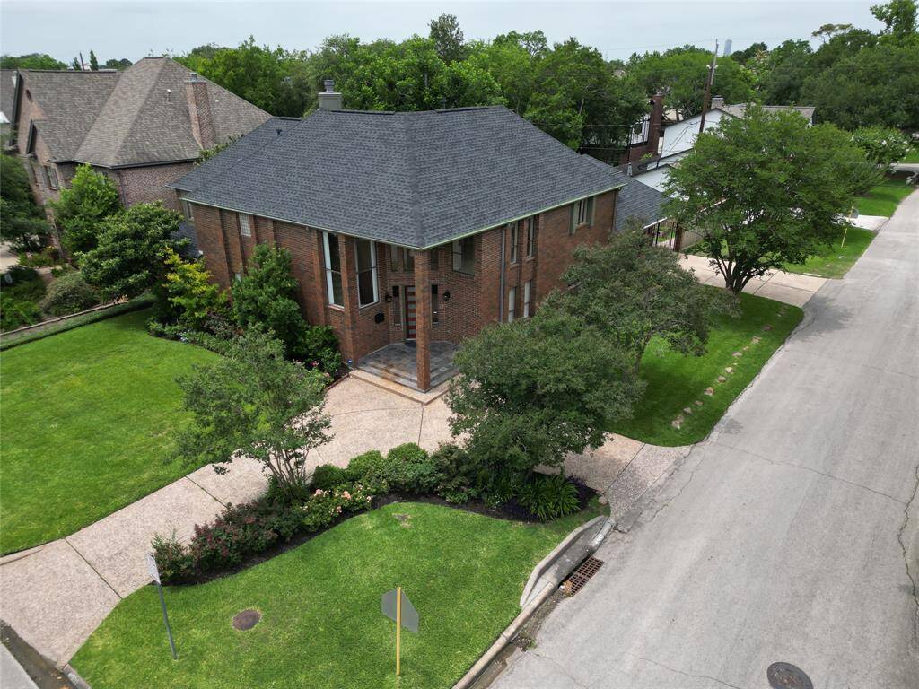 Welcome to 5211 Willow! Four bedrooms, three- and one-half baths on oversized grounds with two car garage.