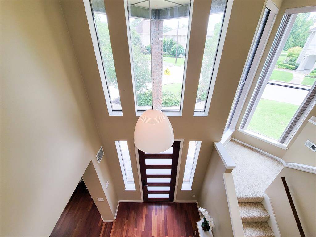 This stunning home features both front and back staircases, offering convenience and charm. Let’s take the front stairs and begin our tour of the beautifully designed upstairs space!