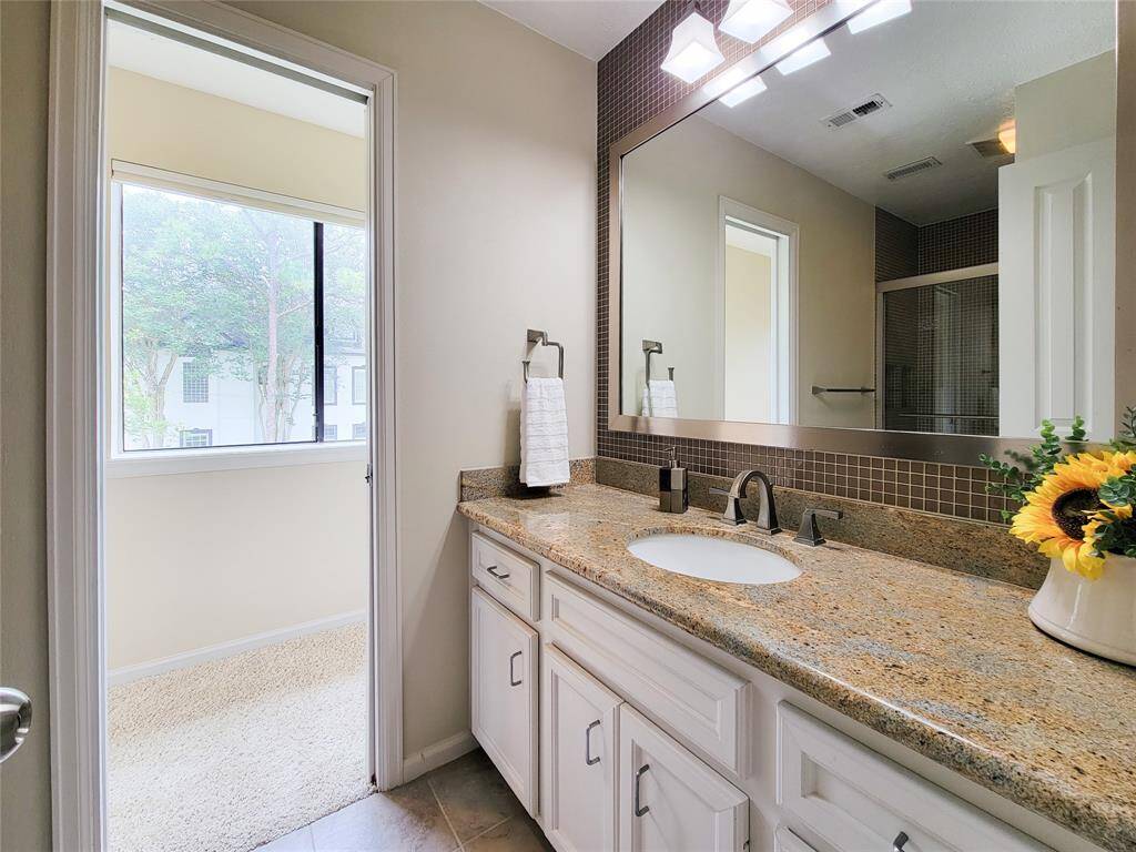 Upstairs bathroom off game room.