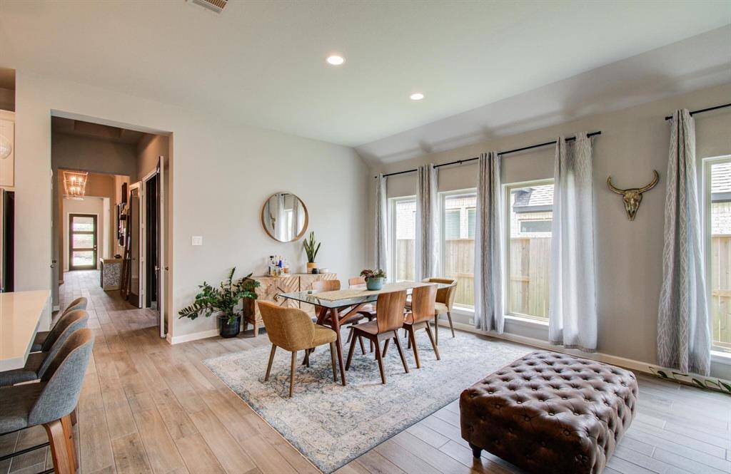 Another angle of the neutral and bright kitchen.