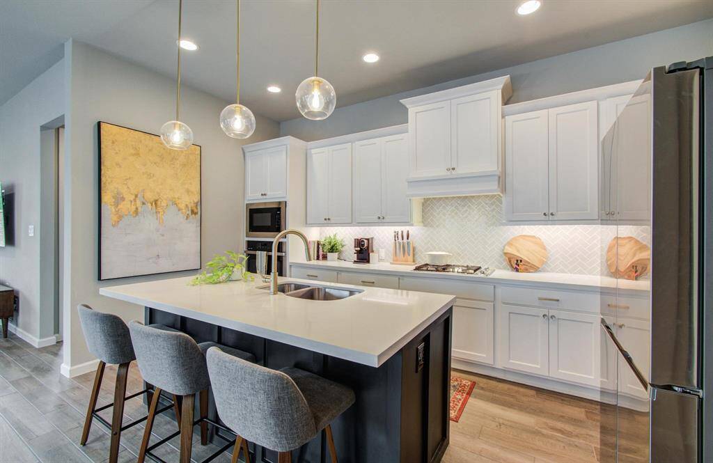 The kitchen is open to the family room, ensuring the chef is always part of the conversation.