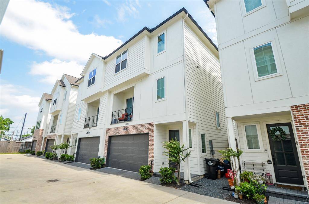 Bright and shining, this exquisite residence is located at 4915 Avenue J, Houston, TX, in the gated, desirable North Bryan Park neighborhood with the private attached 2 car garage.