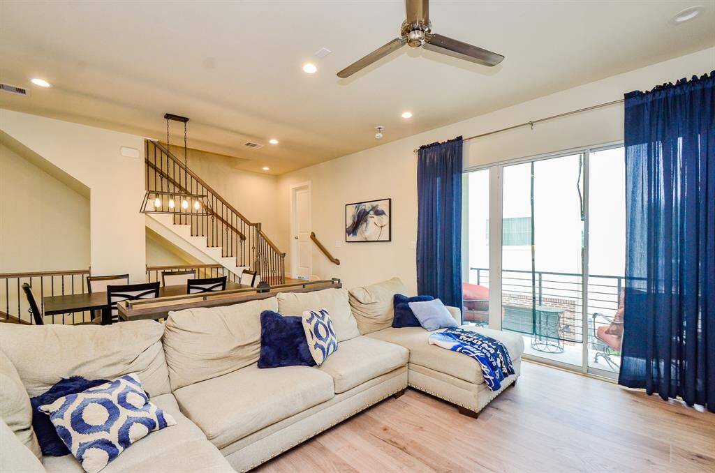A wall of patio sliding glass doors opens onto your own private 2nd floor balcony! What a marvelous bonus, especially when entertaining.