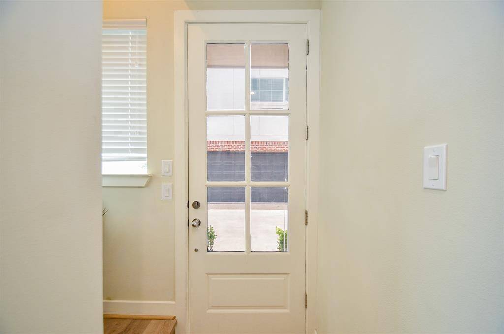 The 1st level front door easily accesses the garage area.