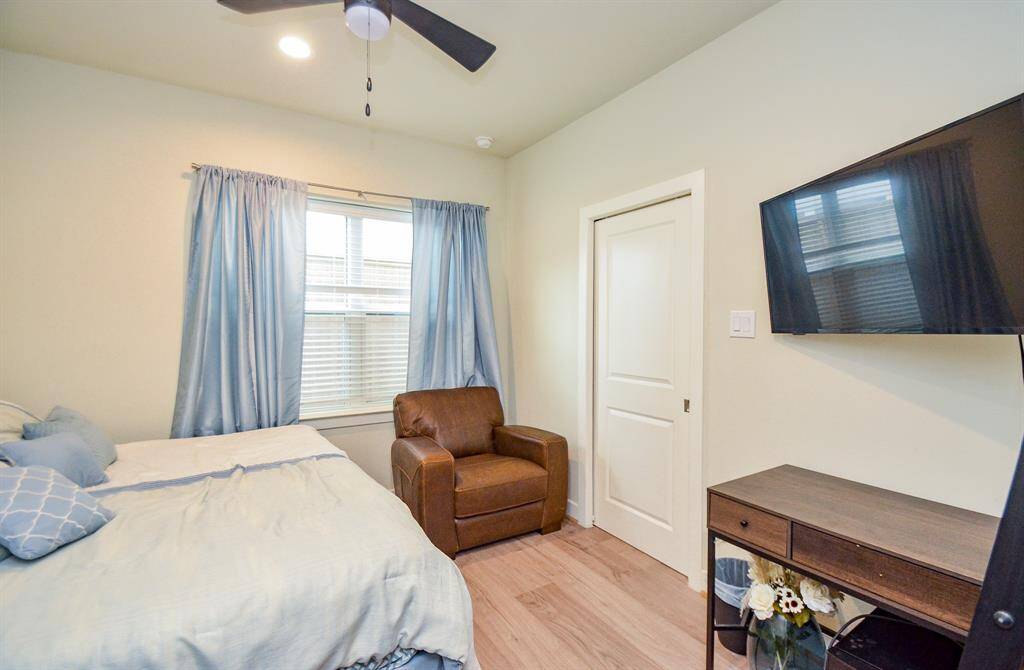 Bright natural light fills this secondary bedroom.