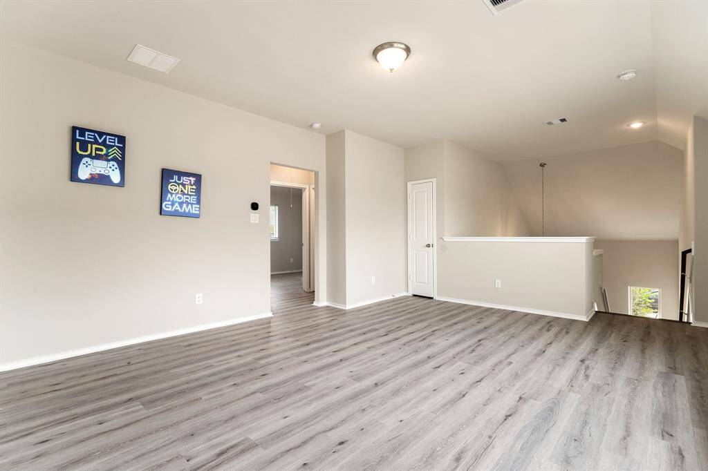 Spacious game room perfect for play, work, or a flexible study room setup as needed