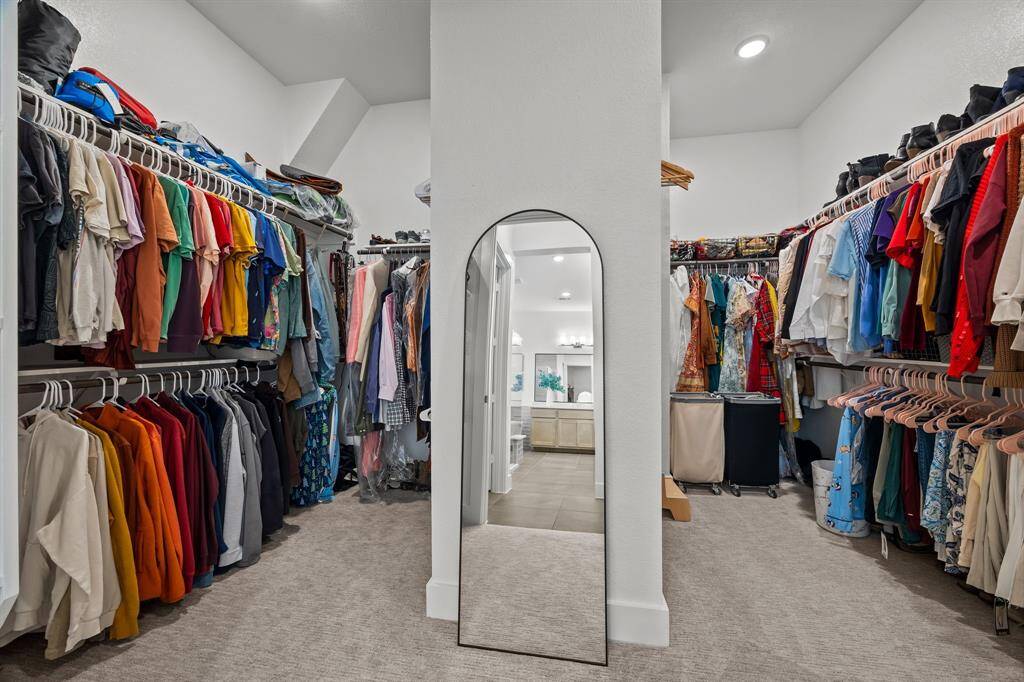 You can't help but be impressed by this Texas size walk-in closet.