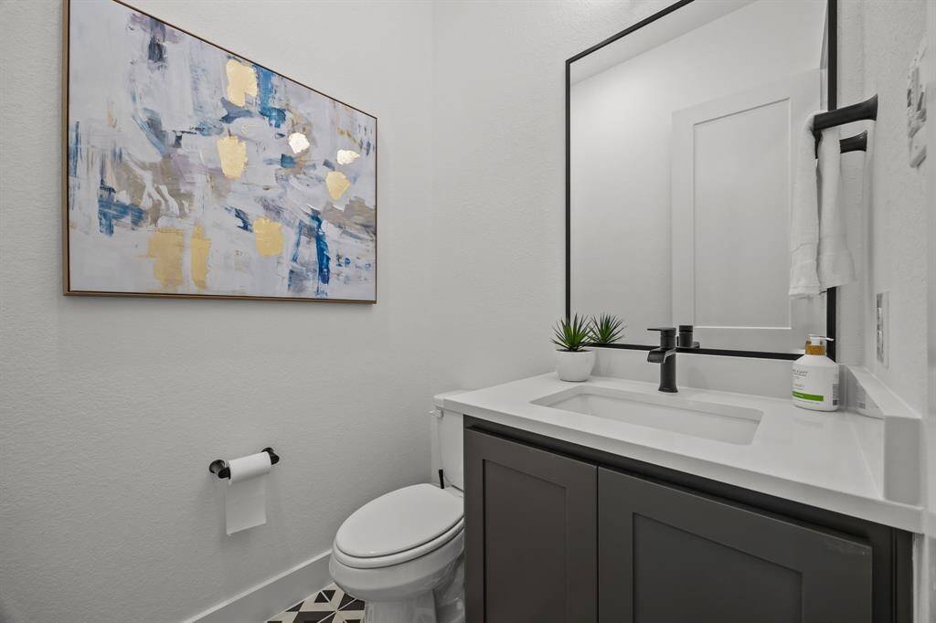 The half bath serves the main living areas.
