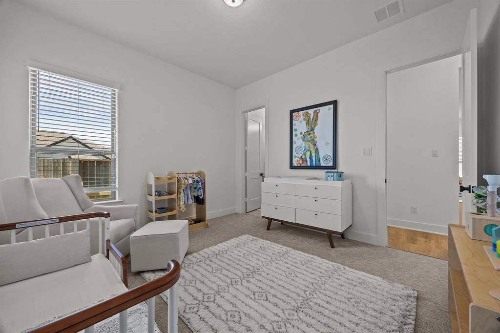 The fourth guest retreat is tucked away off the game room. The convinces continue with ample space for large furniture and a vast walk-in closet.