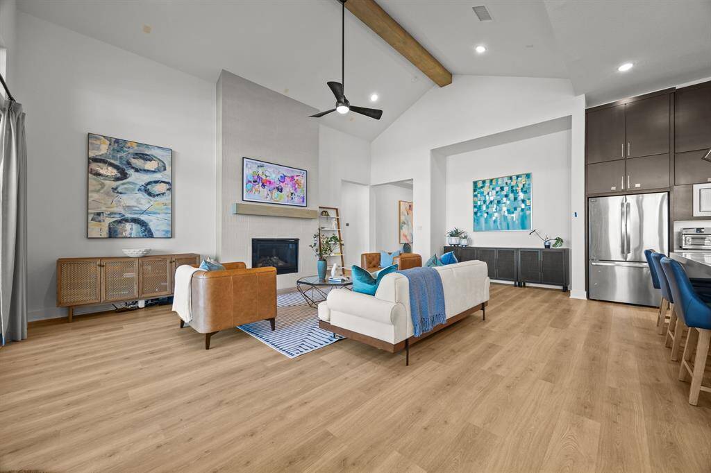 This spacious living space provides comfortable room for everyone even when hosting large gatherings.