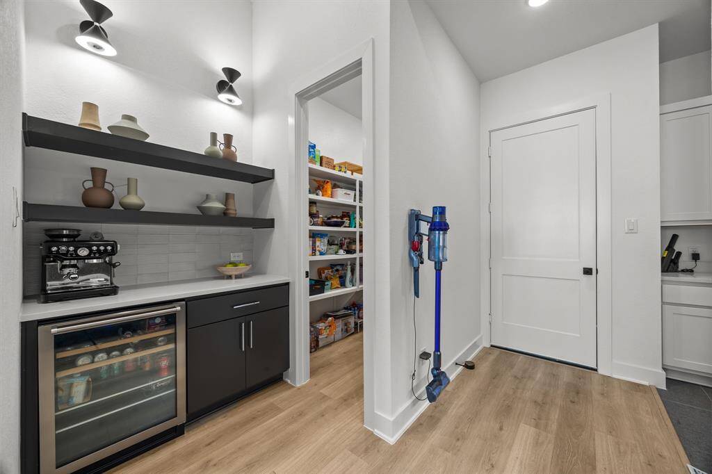 Designed with everyone in mind, this drink station can be set up to fit your custom needs; it comes complete with wine fridge.