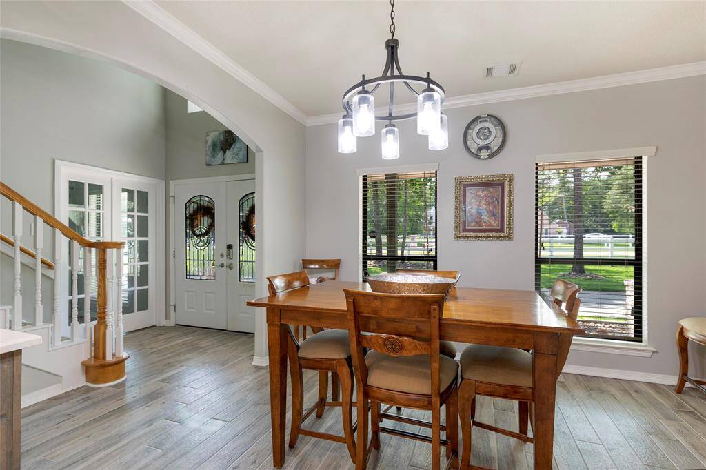 Guests will love enjoying a meal in this dining room. Right off the kitchen, it's perfect for keeping them entertained while you host.