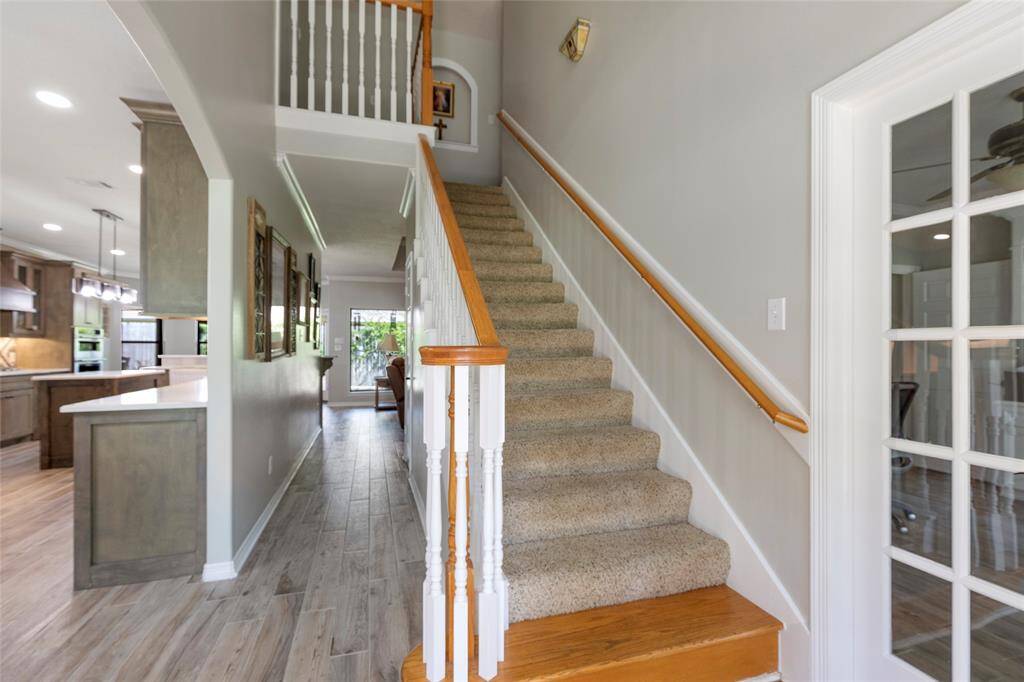 Tons of natural light flows in from the entrance of this home. You are greeted with open concept and a beautiful, modern kitchen.