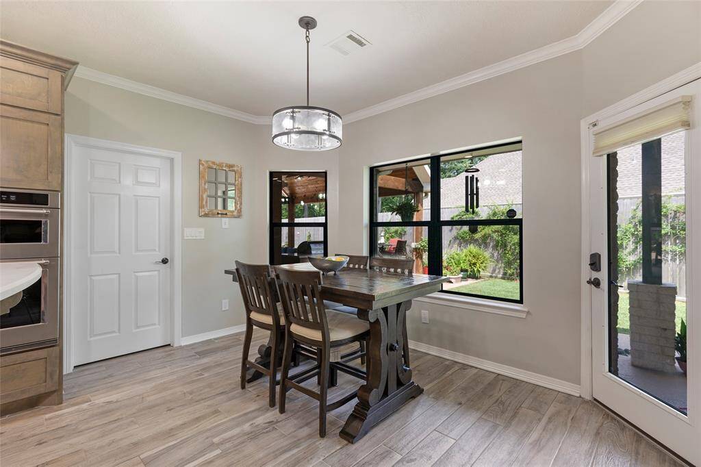 Enjoy a meal in this large breakfast area while surrounded in natural light from the backyard.