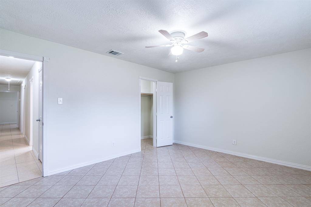 This 3rd very spacious secondary bedroom offers plenty of room for comfort.