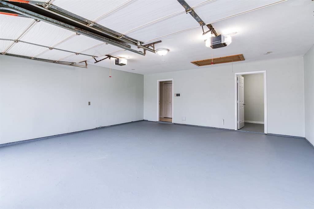 Garage with fresh paint and to the left the tool room for those projects