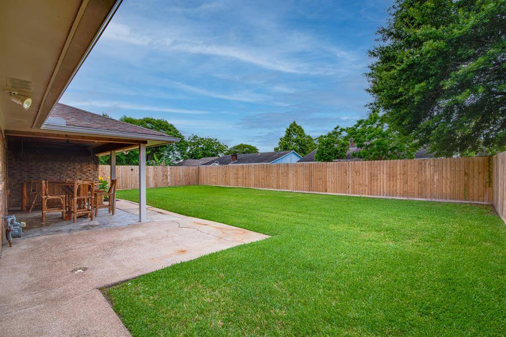 Gorgeous backyard with new fencing and side gate