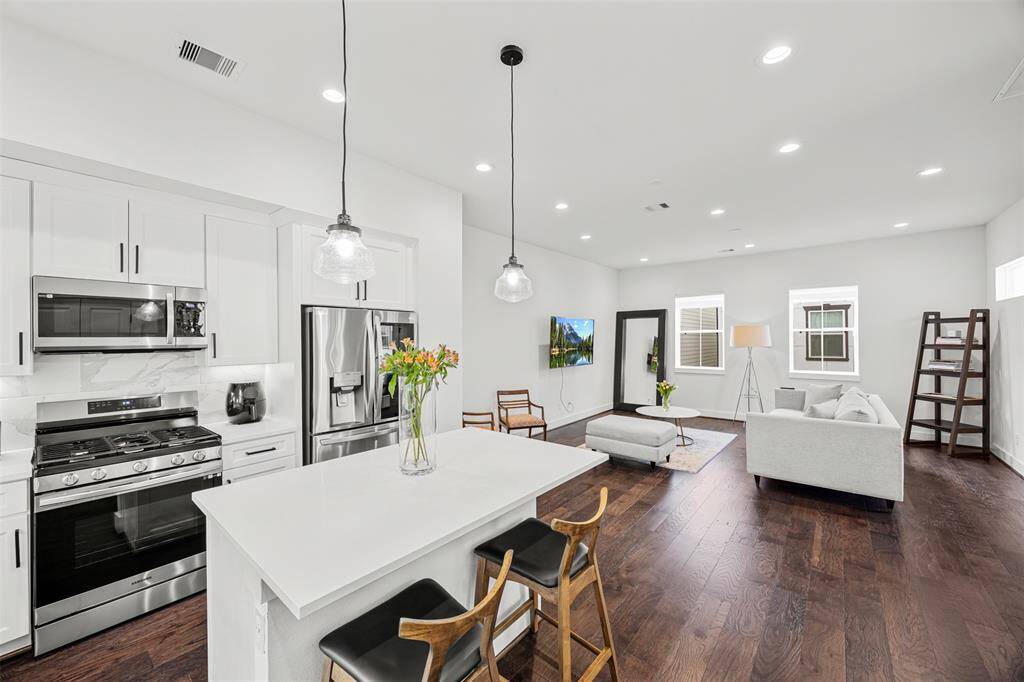 Gorgeous second floor living with open concept kitchen and living room