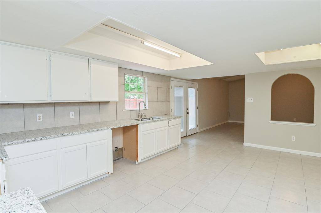Kitchen with log of natural light!