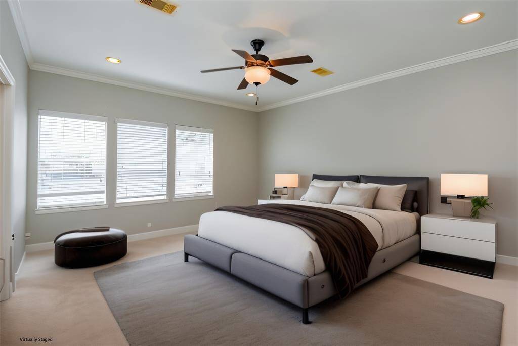 Spacious, bright bedroom with an en-suite bathroom and ample closet space.