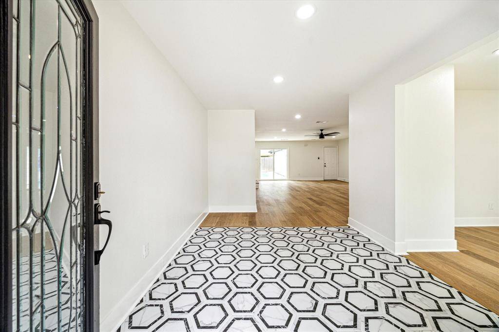 Stylish entryway with beautiful tile