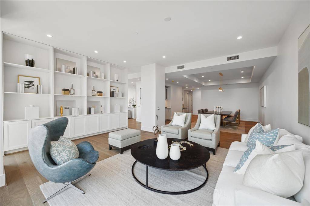 Elegant living room with stylish built-ins and modern design.