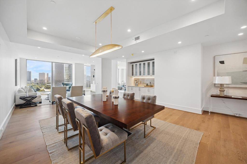 Ideal for hosting, this expansive dining room offers the perfect setting for gatherings.
